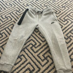 Nike Tech Pants youth size Medium